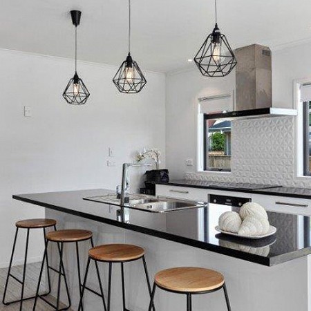 Stylish modern kitchen with Betta Blinds Blockout Roller Blind